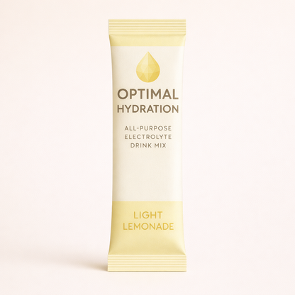 Optimal Hydration all-purpose electrolyte drink mix stick pack for light lemonade flavor on a beige background